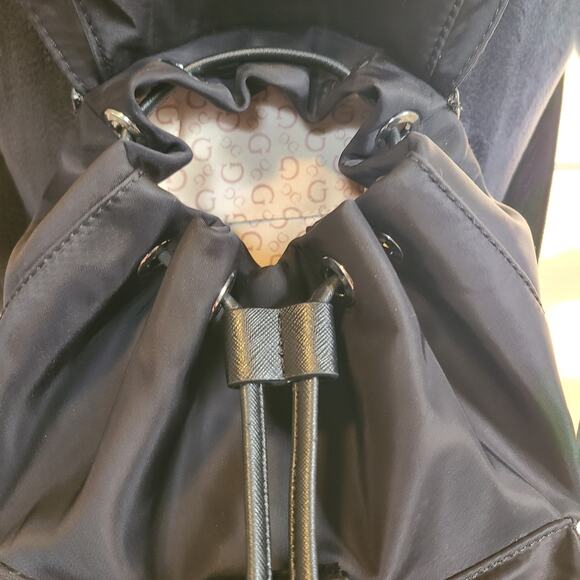 Guess Alpena Nylon Drawstring Satchel Flap Buckle Closure Mini Black Backpack - Picture 3 of 11